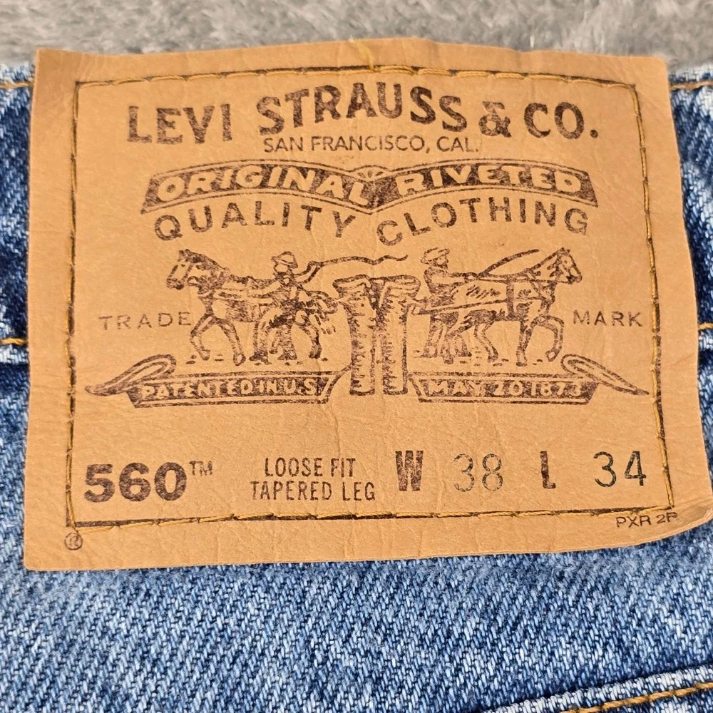 Vintage 1996 Levis 560 Orange Tab Loose Fit Jeans Mens 38x34 Blue Denim Tapered